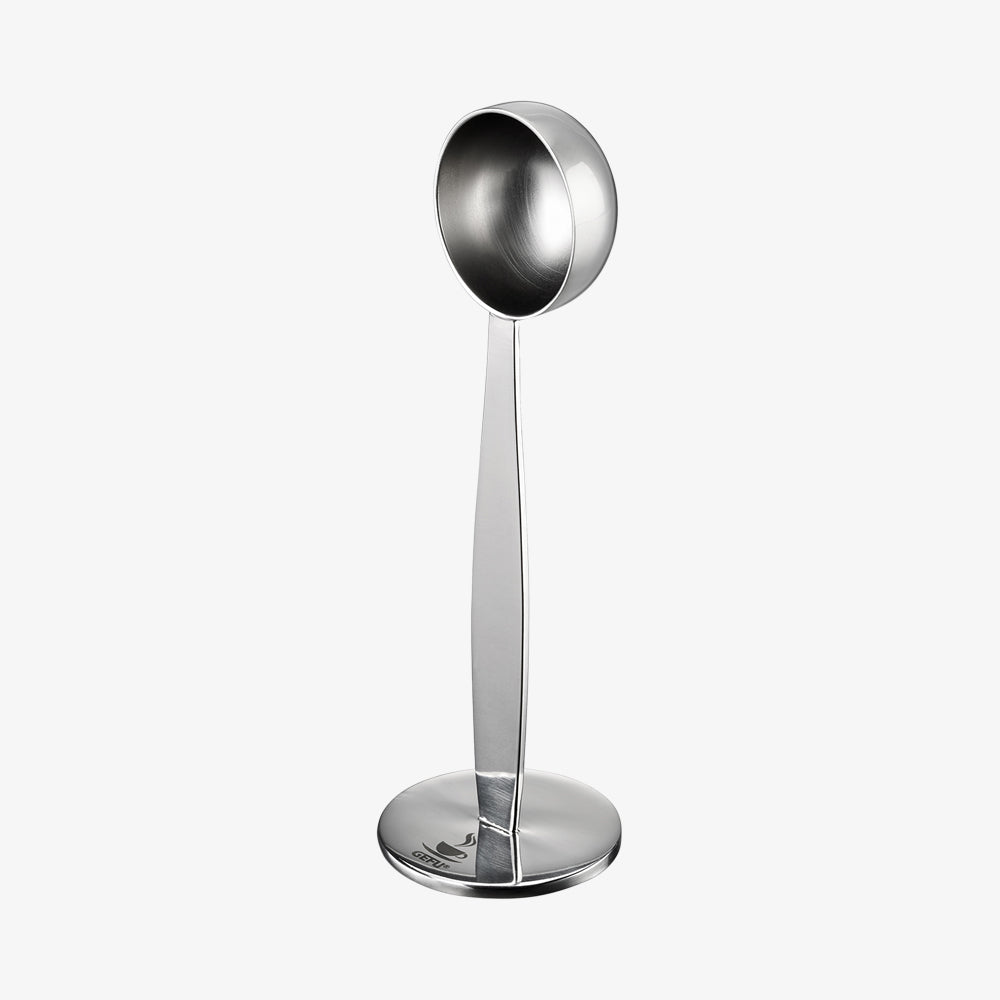 Two-in-one tamper and measuring spoon